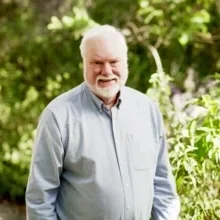 Head shot of  Kenneth P. Roos, PhD